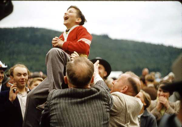 1956-Jerry Nelson Gets Huppcht or Blanket-tossed at the German Grenzgang festival.